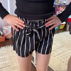 Super cute never worn girls black shorts with strips